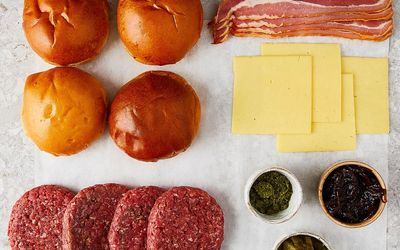 Ingredients to make a burger at home laid out