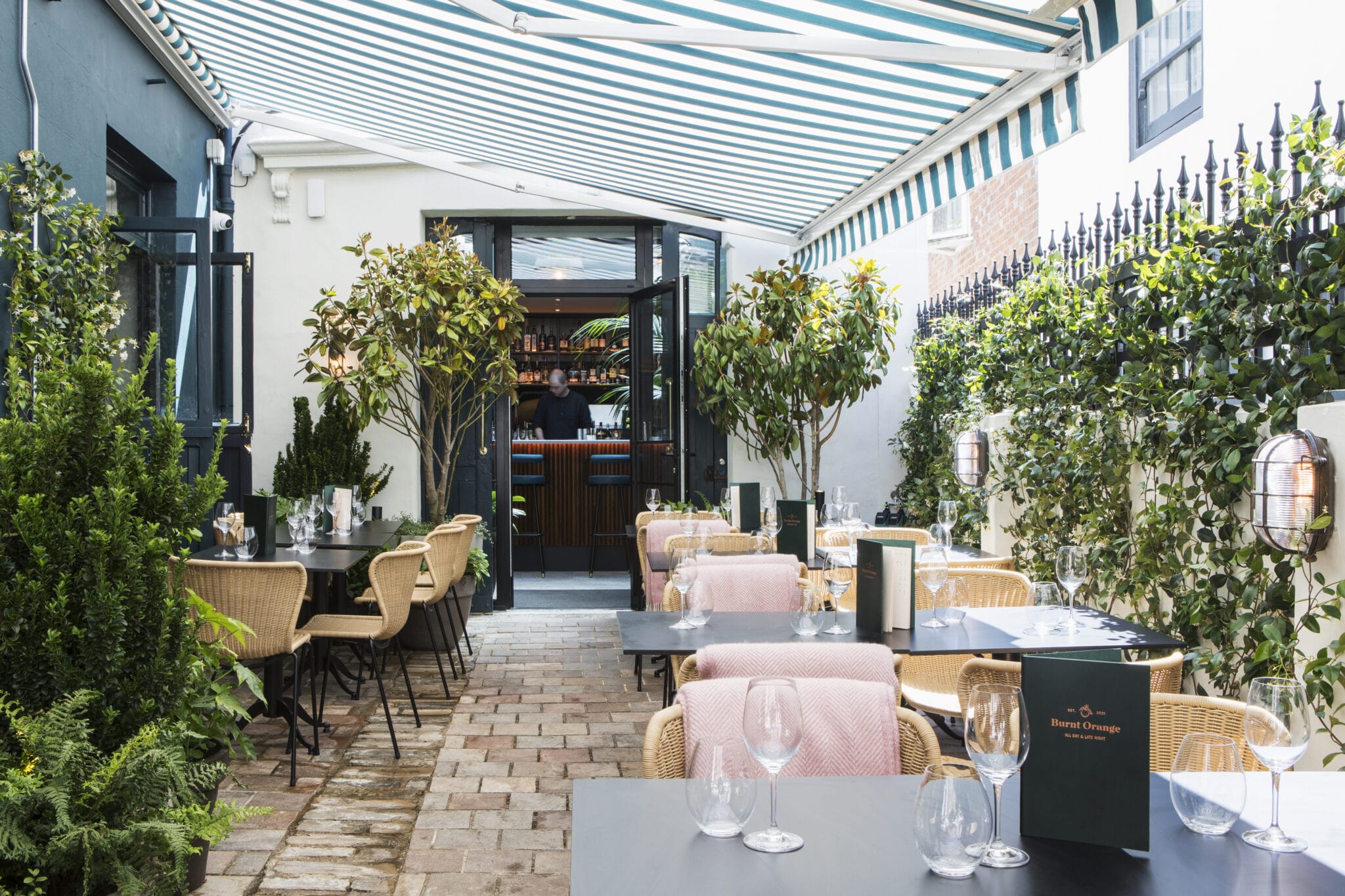 A view through the flagstone courtyard at Burnt Orange