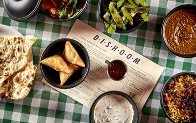 Dishoom dishes on a green checked table cloth
