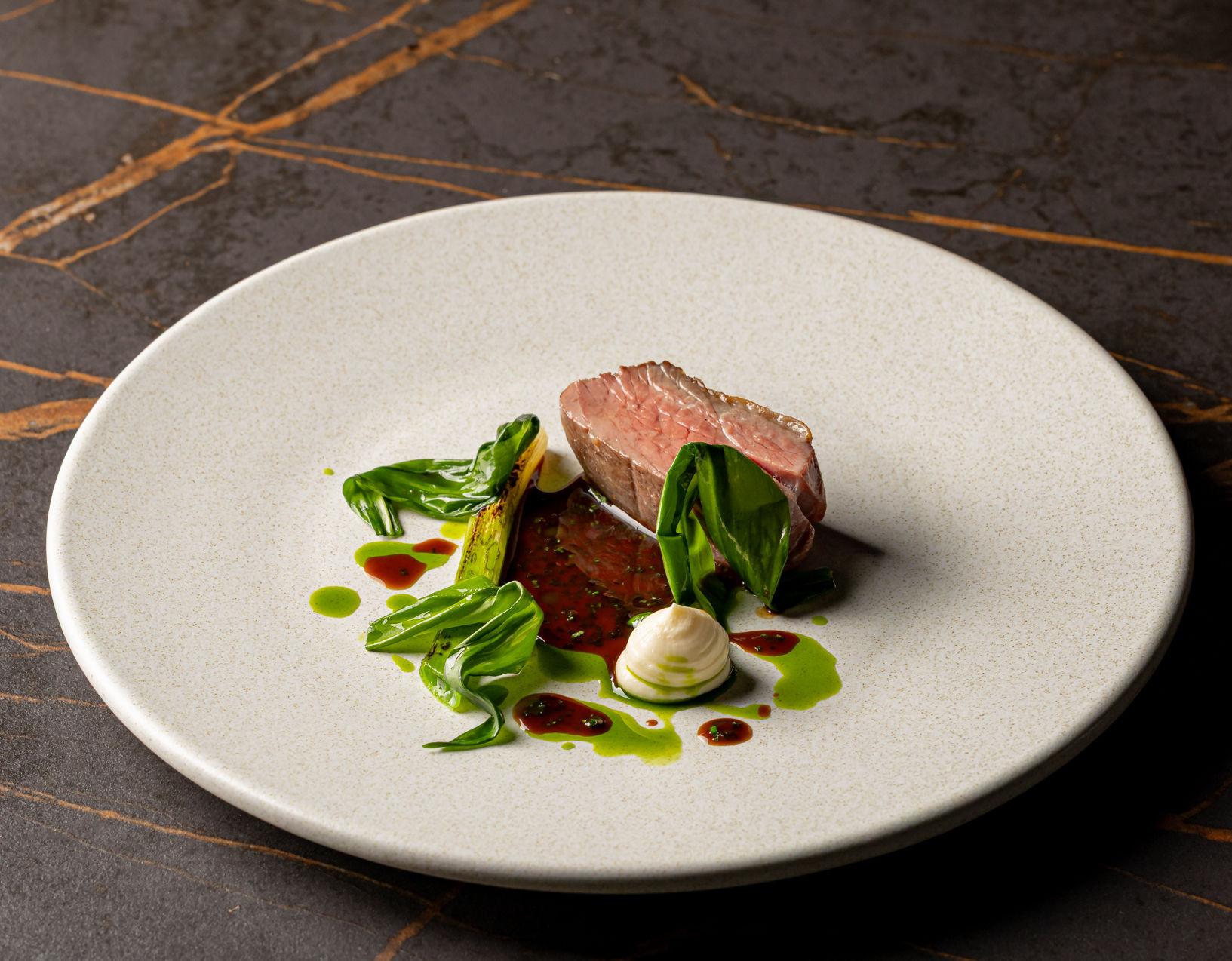 two ingredient led dish at etch restaurant in Hove . Pork main course on white plate 
