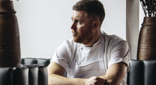Steven Edwards from etch. Sat in the window at etch. restaurant on Church Road in Hove.