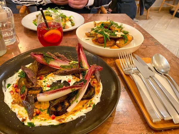 table laid out with three brunch dishes