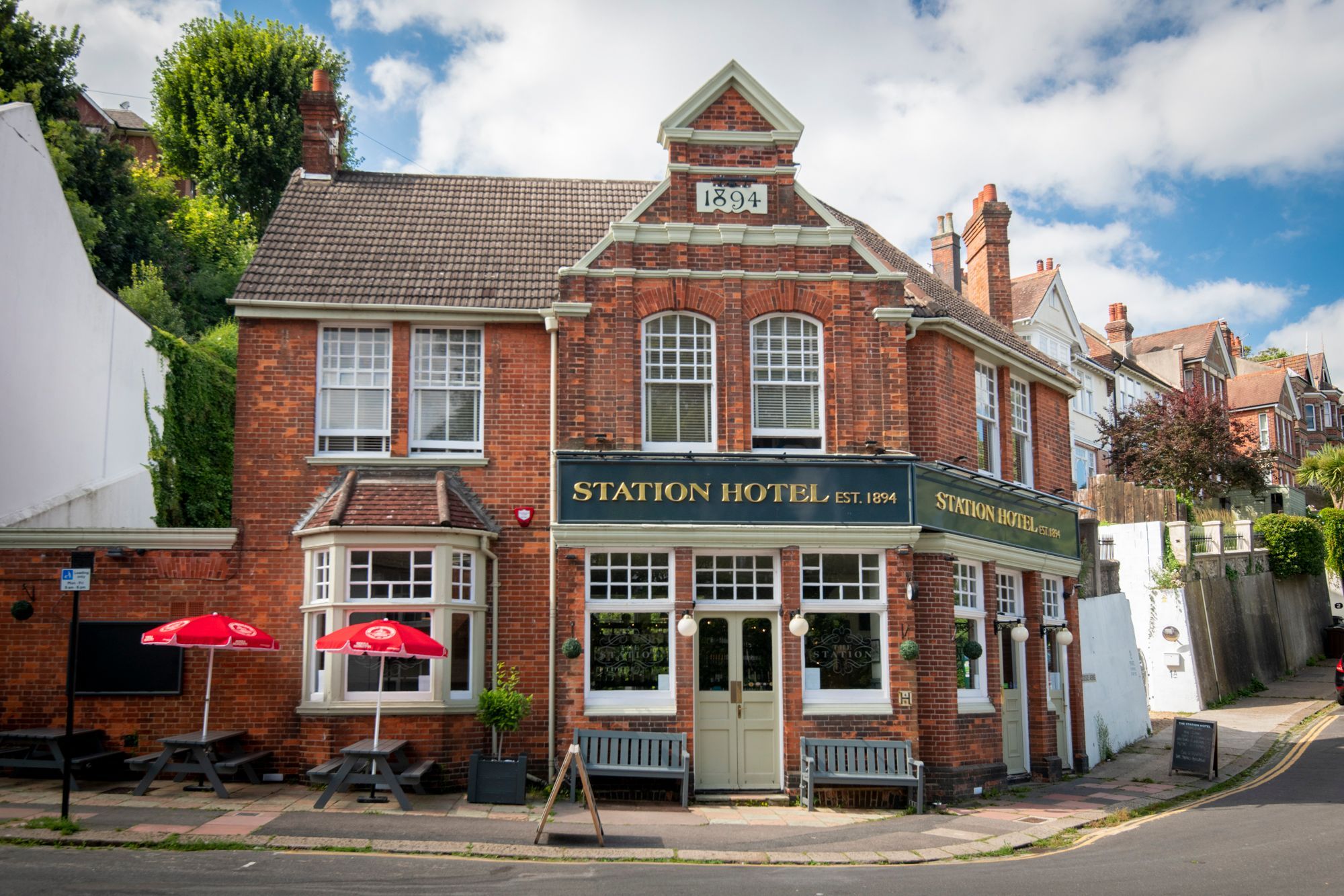 pub with traditional red brick and classic hung sash windows