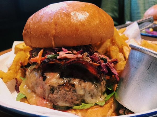 beef, bacon, smoked Mayfield cheese, Honest x Brighton Hot habanero hot sauce, chipotle slaw, rocket and pickles with those famous rosemary salted chips.