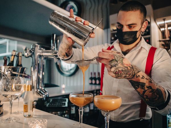 Bartender making cocktails