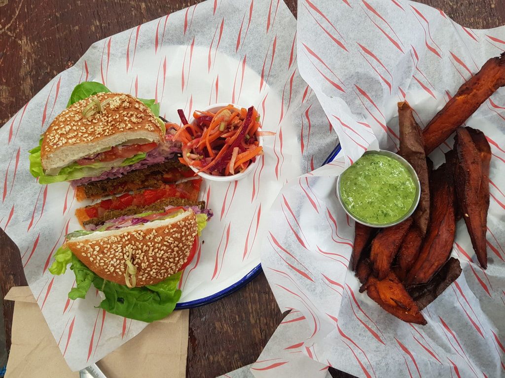 Vegan burger and sweet potato fries take over head