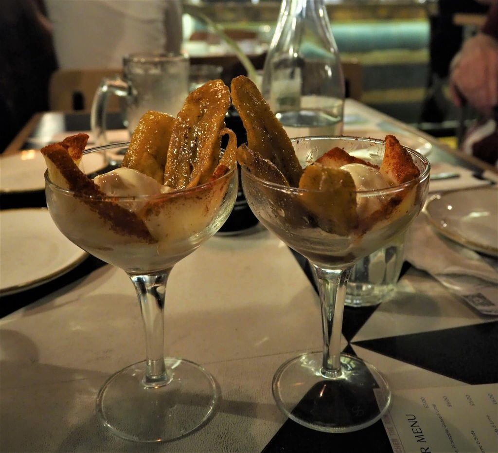 dessert caramel-glazed plantain, rum-soaked pineapple and soft vanilla ice cream