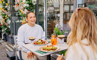 two girls enjoying bottomless brunch at baked Hove
