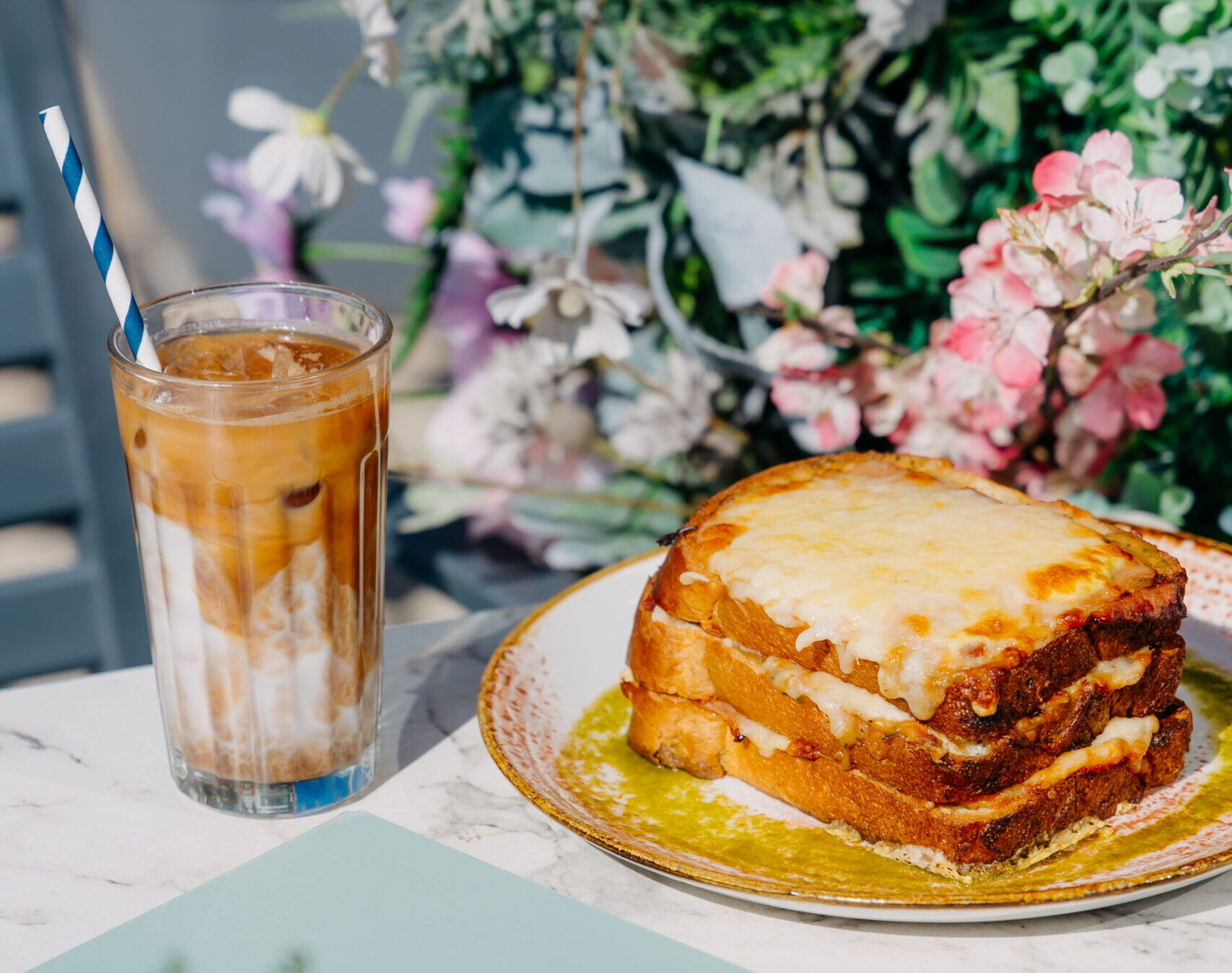 croque monsieur and ice coffee served at Baked in the garden