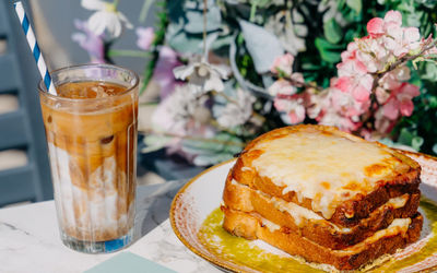 croque monsieur and ice coffee served at Baked in the garden