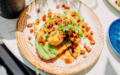 over head shot od the toast with avocado and eggs