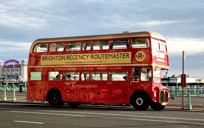 red bus on Brighton seafront, afternoon tea in Brighton