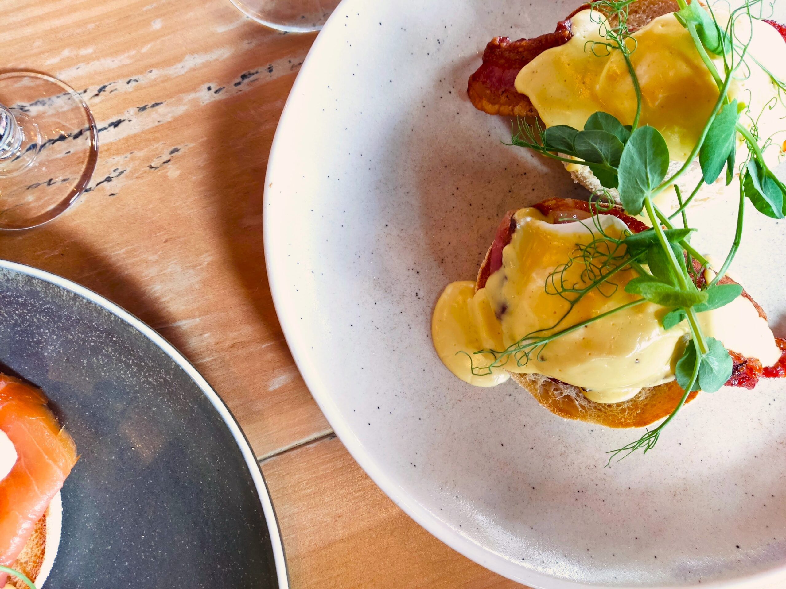 over head shot of egg hollandaise on the white plate