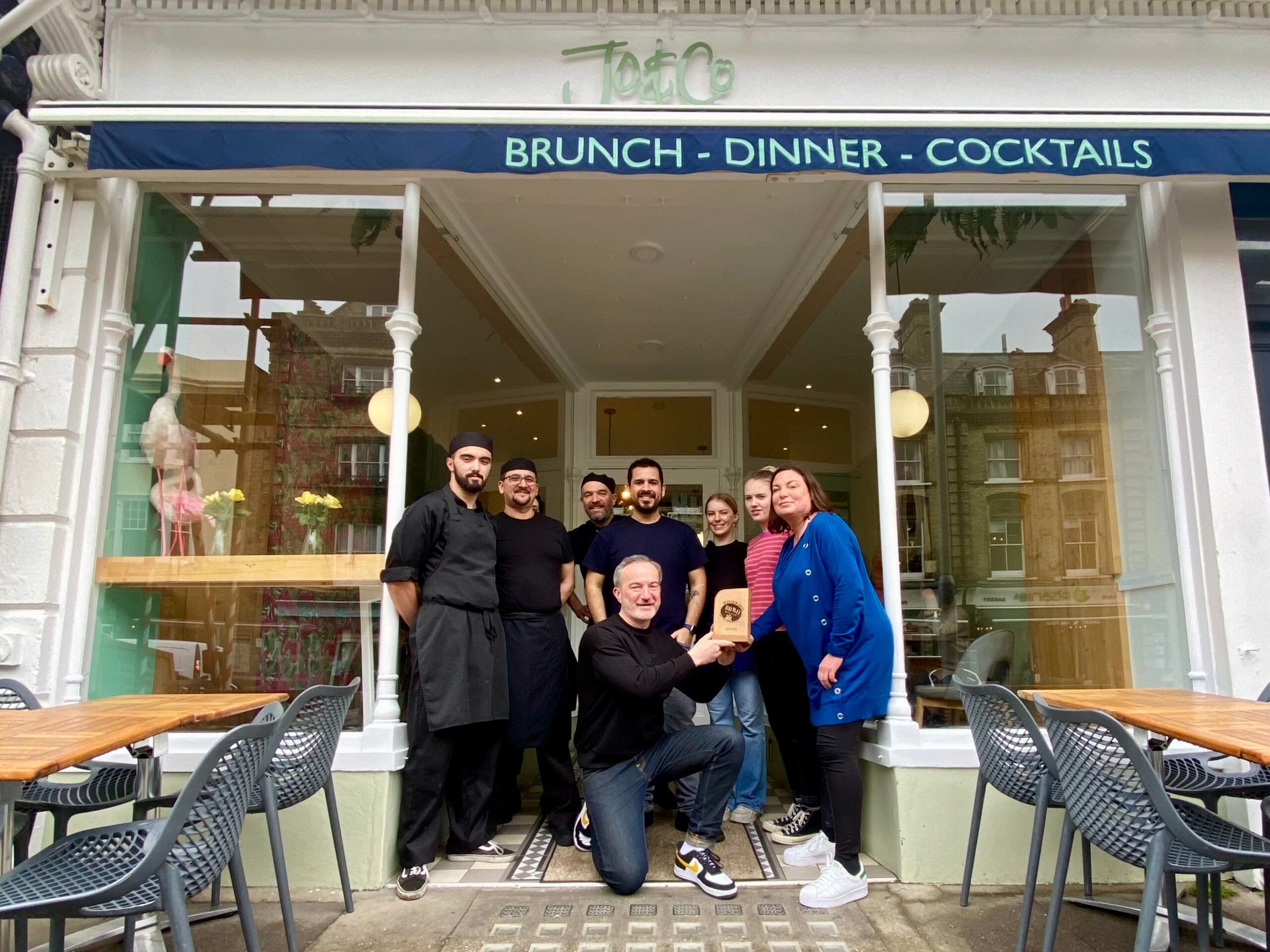 2022 BRAVO winner Jo and Co Hove. Pictured, the Jo and Co team outside the front of their cafe.