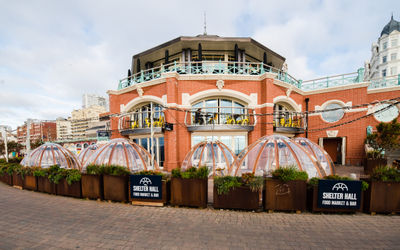 exterior shot of the shelter hall market, igloos