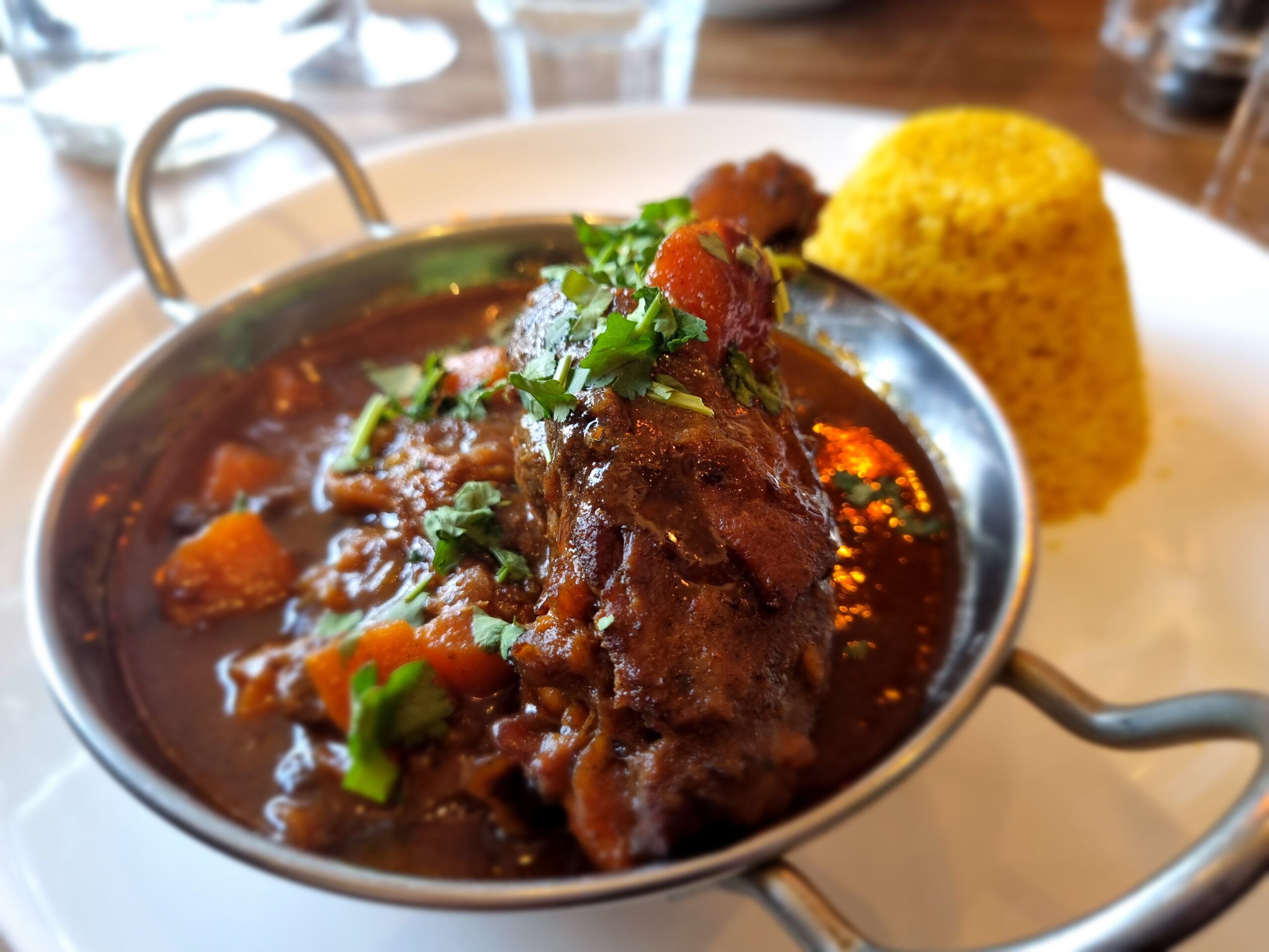 Duck Leg Tagine, a slowly braised duck leg with sweet and savoury Moroccan spices in a rich aromatic sauce