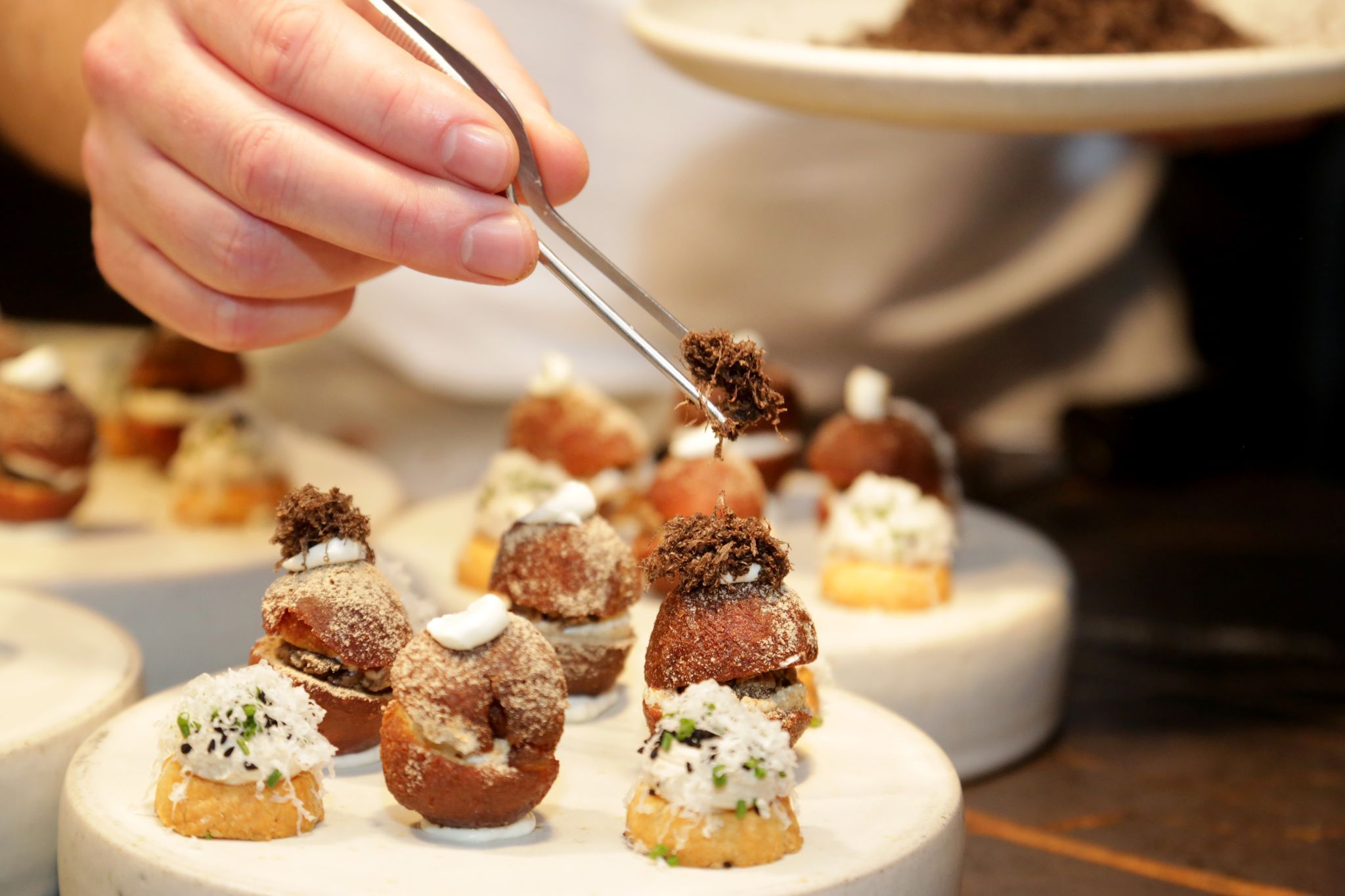 chef decorating a dish