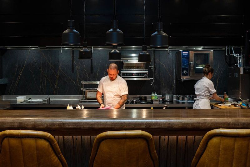 open kitchen concept at Furna Brighton, chef Dave cooking. Furna is a fine dining restaurant in Brighton. Furna is also an excellent spot for pre theatre dining in Brighton