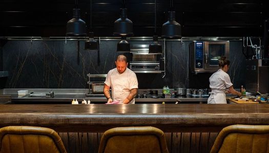 open kitchen concept at Furna Brighton, chef Dave cooking. Furna is a fine dining restaurant in Brighton