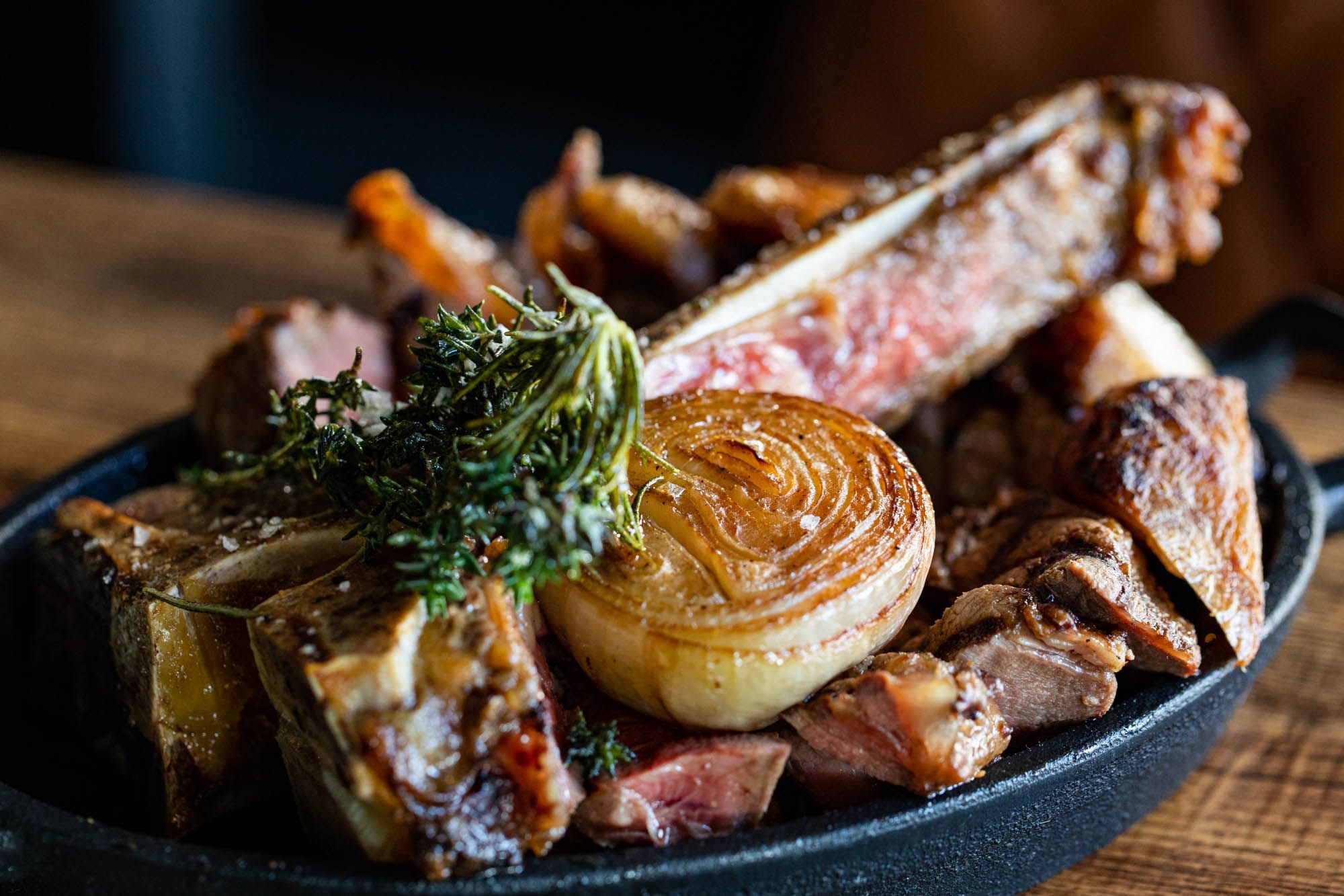 ribeye steak served in the black plate 