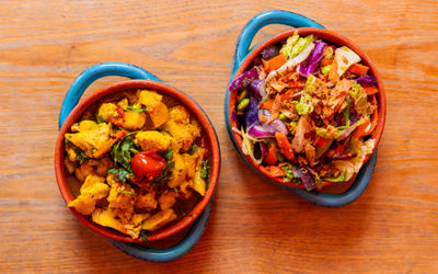 two blue bowls with the dishes