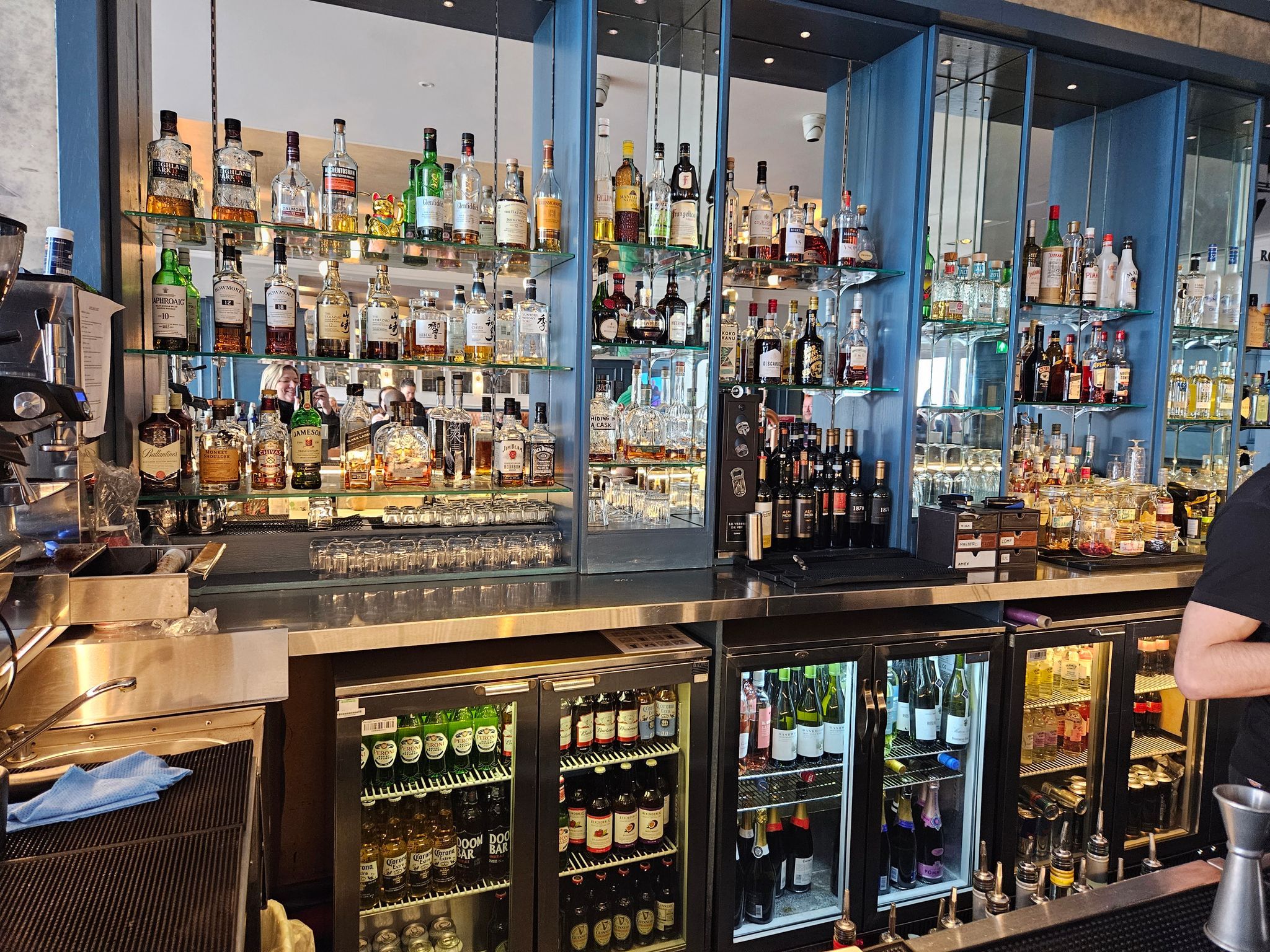 bar area of the metropole bar brighton, lots of drinks on the shelves