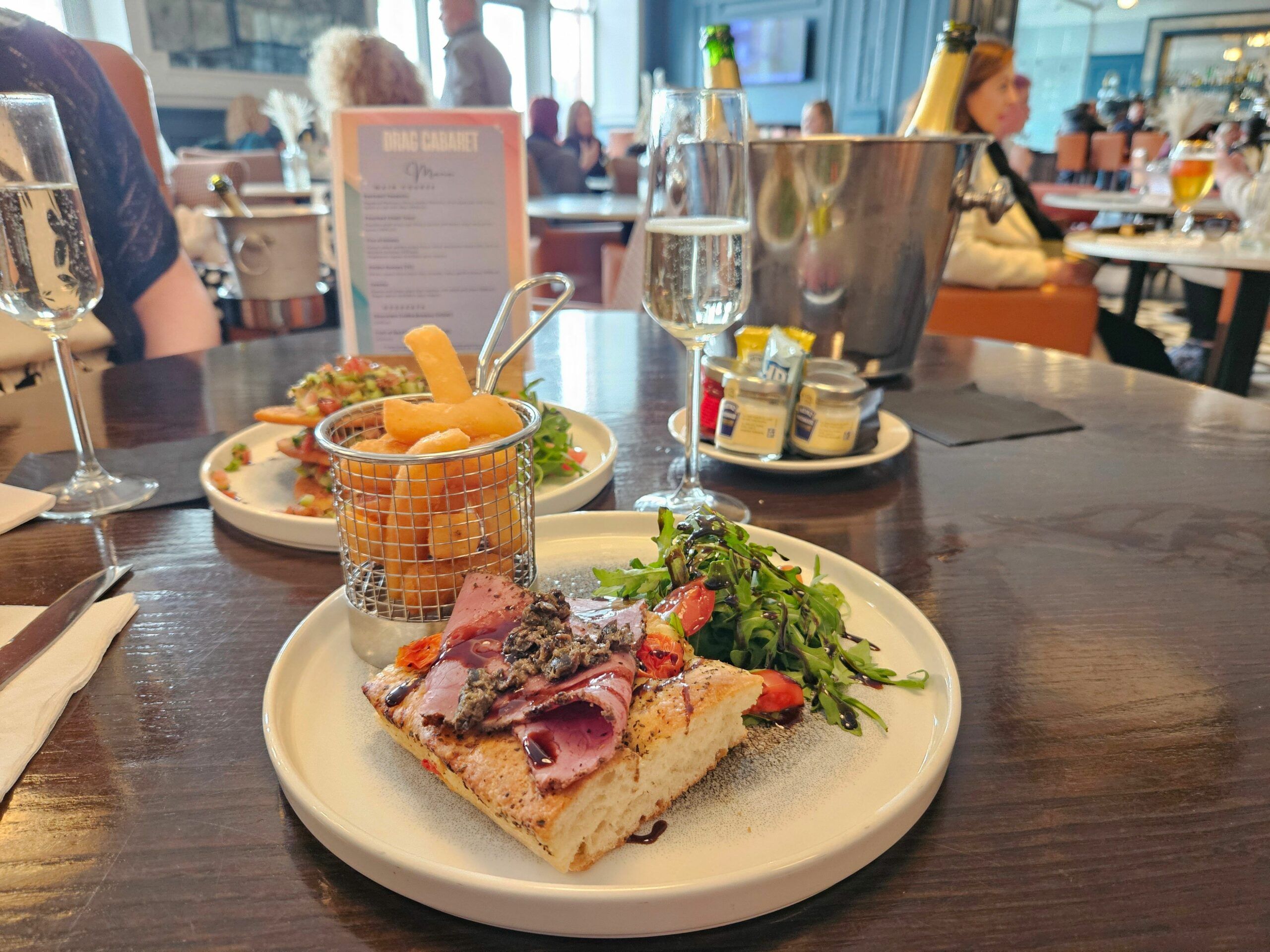 Peppered Pastrami Focaccia served as part of drag queen brunch at metropole bar