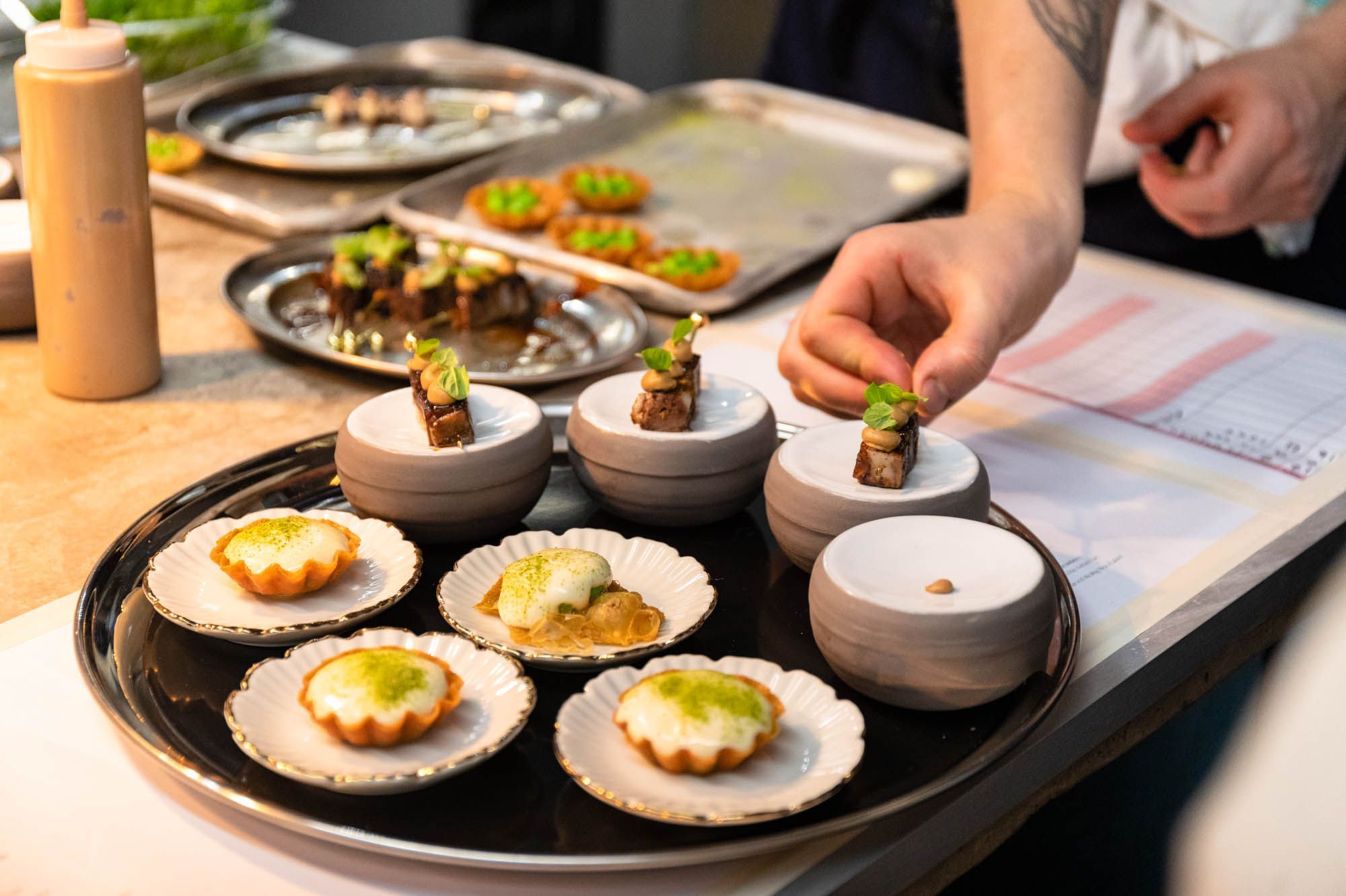 chef adding decoration to dishes at the dilsk