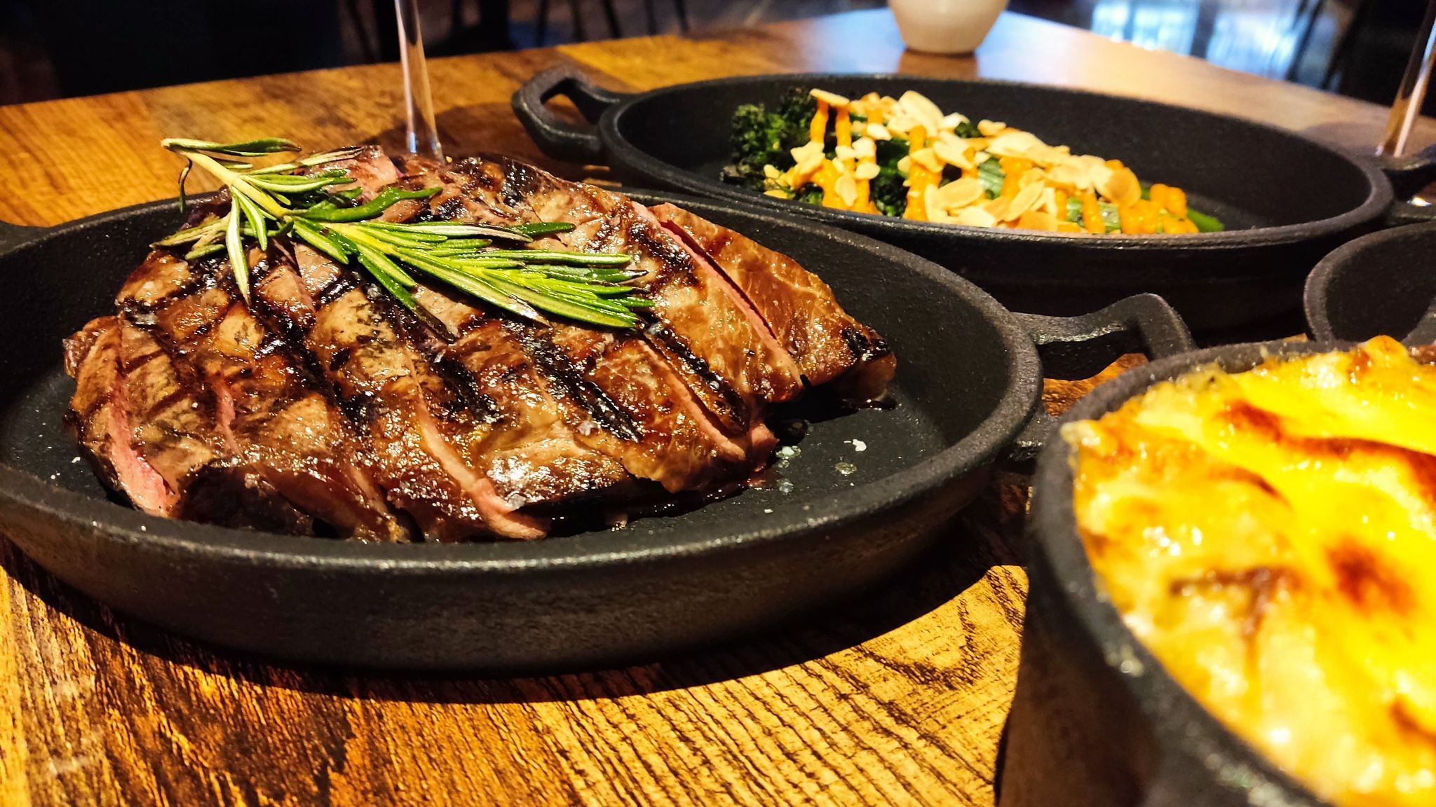 delicious cut steak served on the black plate at the new restaurant in Hove, Carne