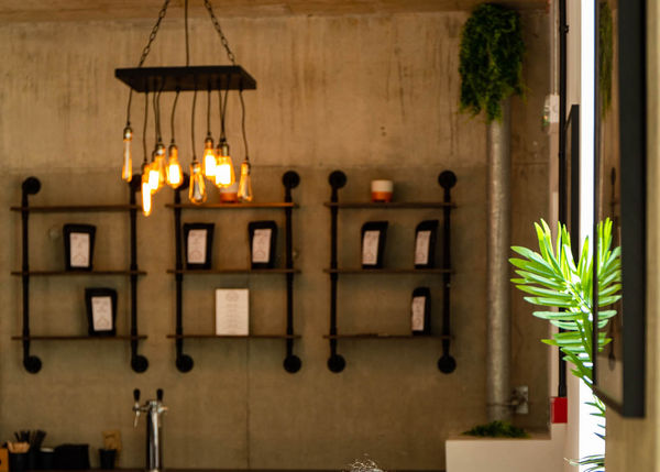 Shelves and pendant lights at White Cloud Coffee