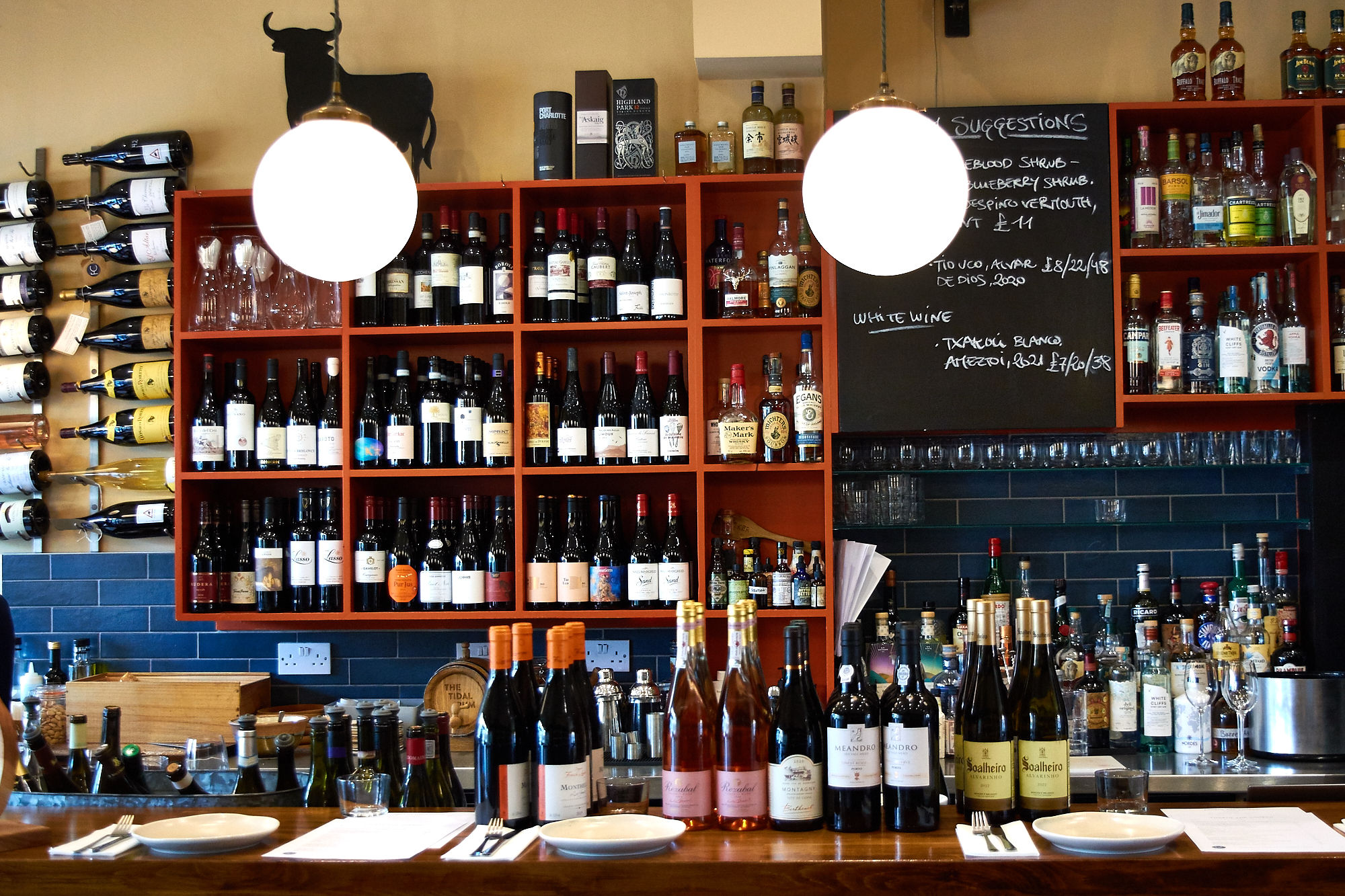 Fourth and Church shelves filled with various wines. English Wine Week 2025