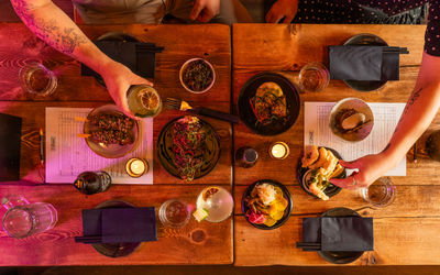 over head shot of table laid out with dishes and drinks at Bonsai Plant Kitchen