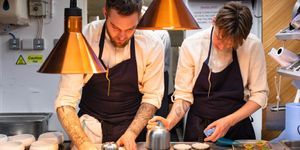 two young chefs preparing dishes at dilsk, fine dining Brighton