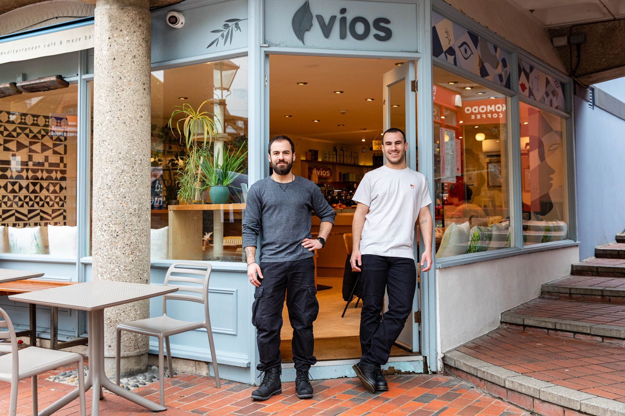 Constantine and Philippos standing in front of the Vios Brighton