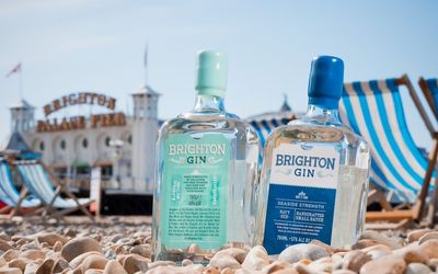 Pictured, Sussex made Brighton Gin on Brighton seafront in front of Brighton Pier