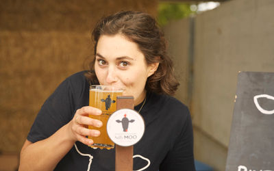 Rachel drinking Silly Moo Cider at Trenchmore Farm