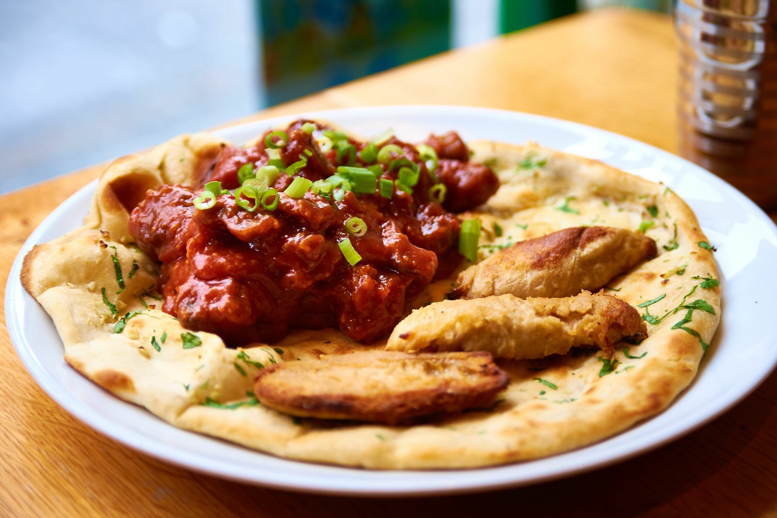 Mouthwatering new brunch menu at the Curry Leaf Cafe. Vegan Sausage and Mushroom Naan dish