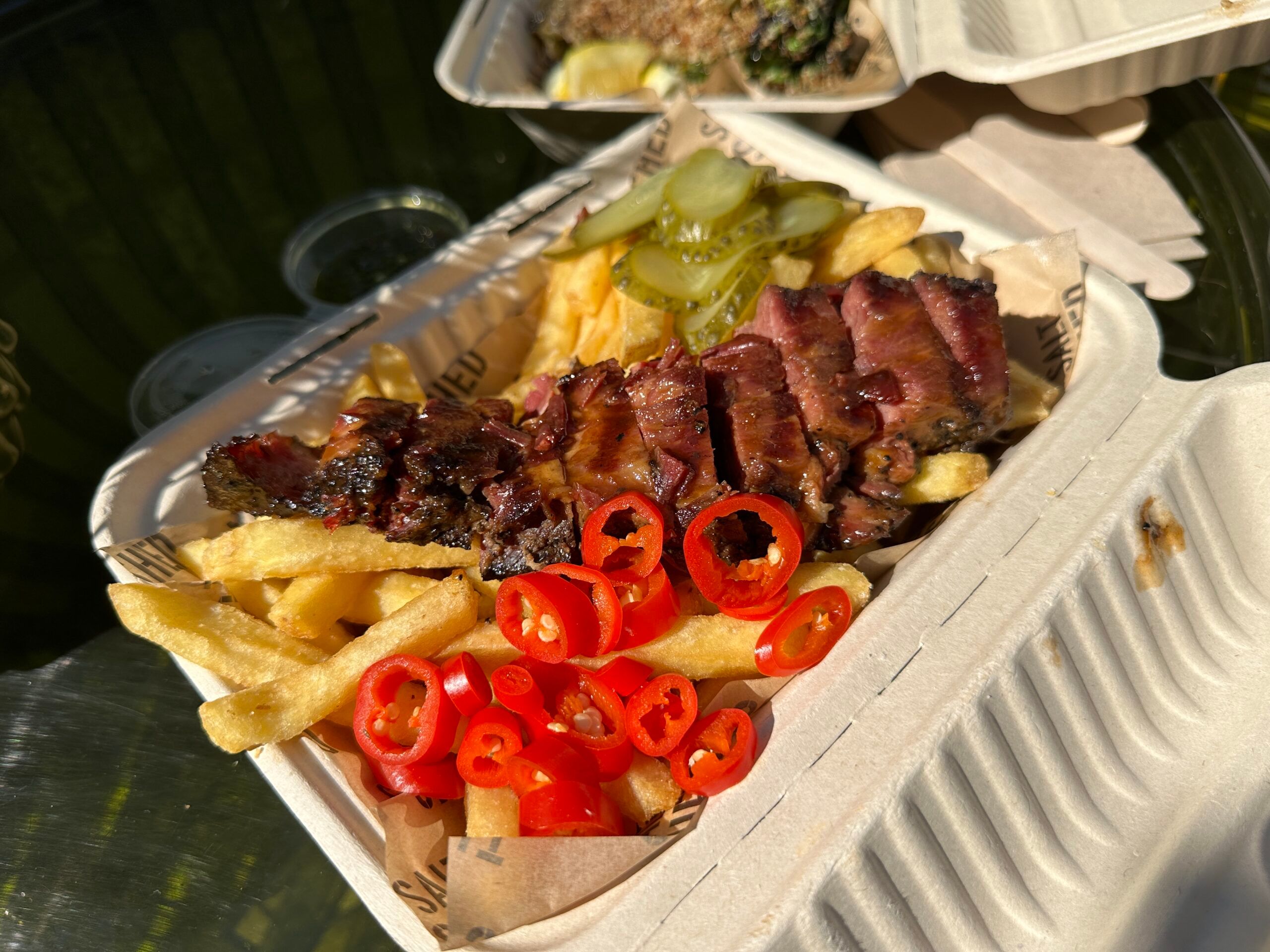 pastrami with fries, pickles and paprika. The Salt Shed