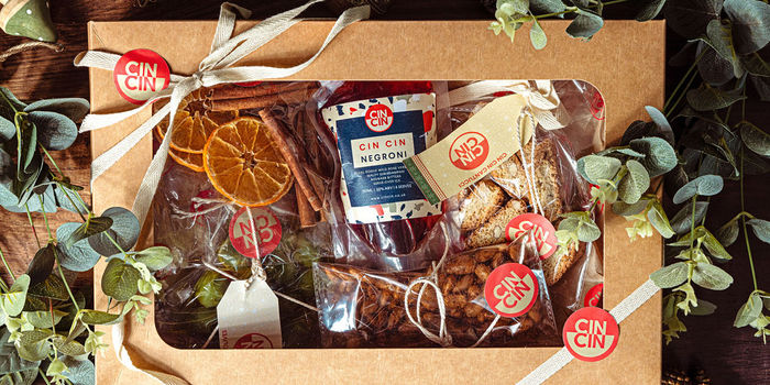 Christmas box at Cin Cin. A foodie christmas gift wrapped in a brown box with ribbon.