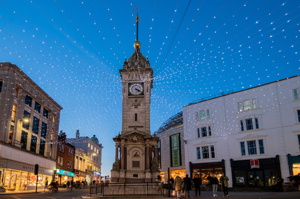 The Brighton Clocktower looking magnificent on Queens Road/ North Road intersection. The clock tower area of Brighton is a gateway area where you can access plenty of Brighton restaurants. Front page image for Restaurants Brighton. Showing twinkly lights and a blue Brighton sky