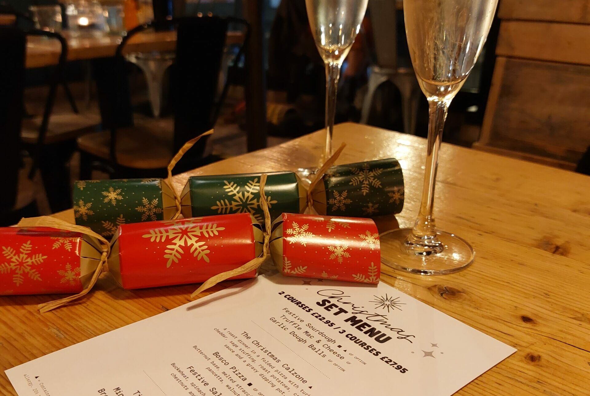 Crackers and a glass of sparkling for a Purezza Christmas
