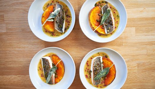 over head shot of the four plates of the main dish at the Little Fish Market restaurant in Hove. Duncan Ray and his team feature in the Michelin guide and have 3 AA Rosettes. All dishes pictured are fish dishes.