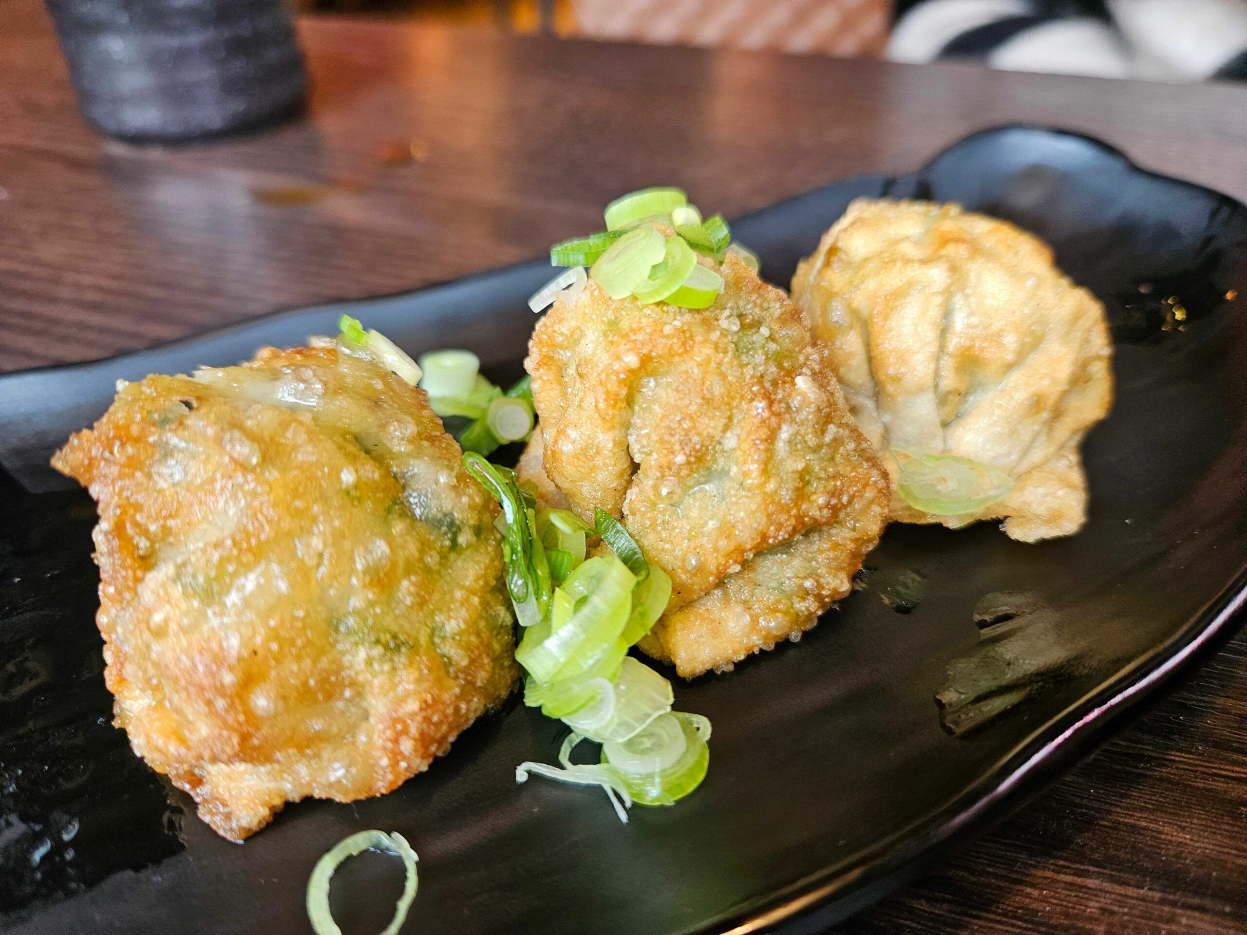 rawn Gyoza, served deep-fried and crunchy, with a traditional dumpling dipping sauce