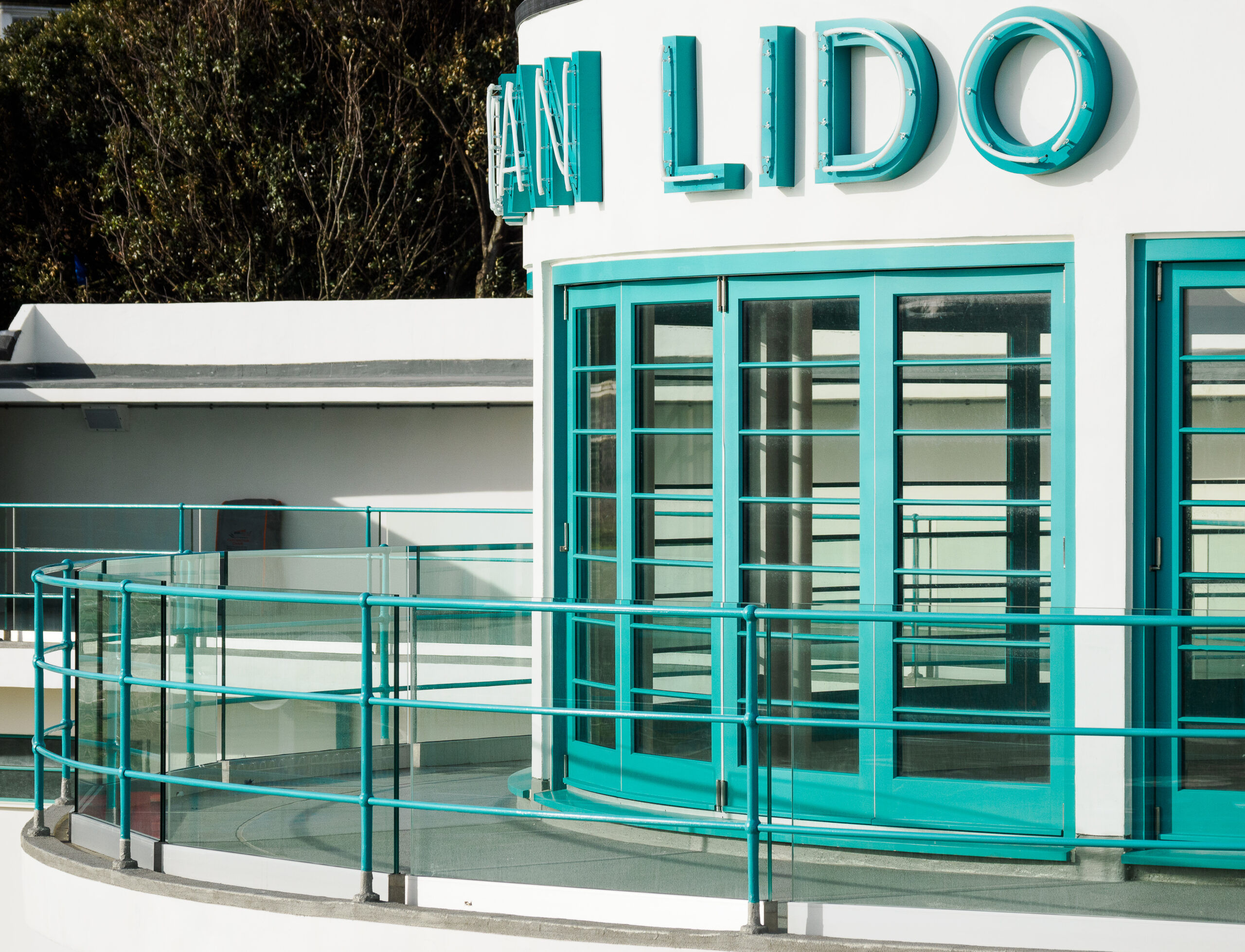 The Saltdean Lido first floor which will be home to the new Deco restaurant. Pictured, a curved building with white and light blue facade. With railings. 