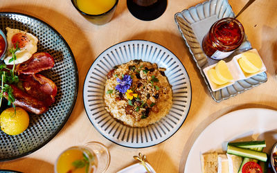 Overhead photo of a table full of brunch dishes at BRAVO winning Terra Restaurant, Tottington Manor