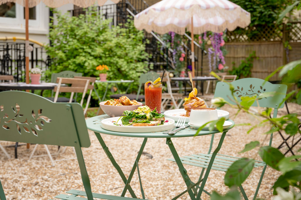 Alfresco dining at Oeuf in Hove in a pretty garden.