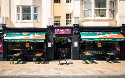 The exterior of MEATliquor on a sunny day with the alfresco seating.
