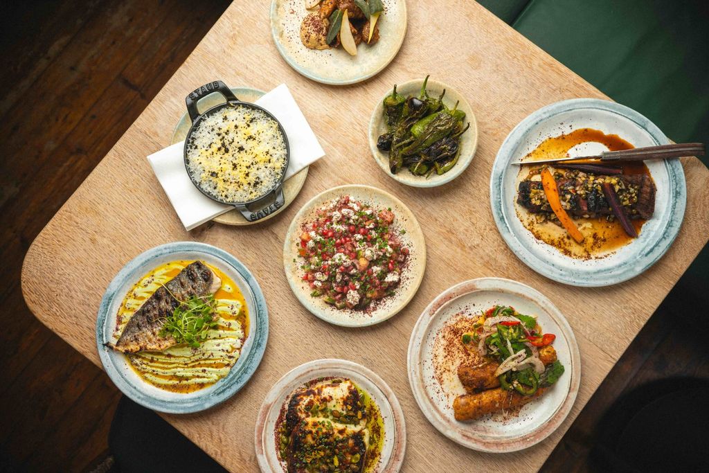 over head shots of the small plates at Burnt Orange Brighton. Burnt Orange is placed runner up for th ebest lunch in Brighton and Hove in the 2025 BRAVO Awards.