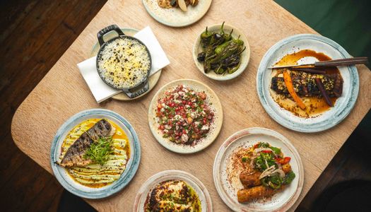over head shots of the small plates at Burnt Orange Brighton. Burnt Orange is placed runner up for the best lunch in Brighton and Hove in the 2025 BRAVO Awards.