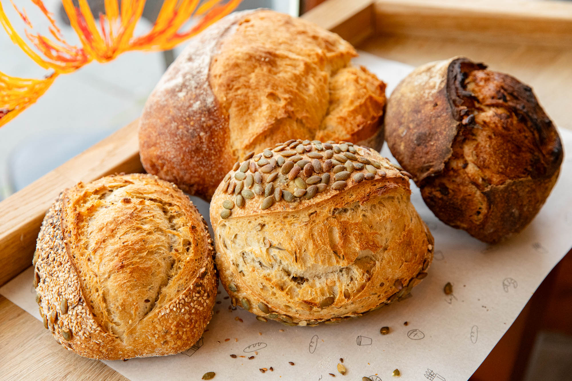 various breads next to each other made at Bayon Bakery